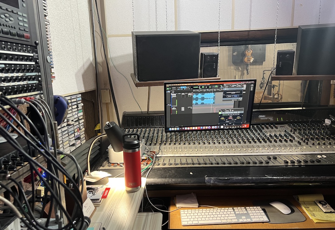 Audio mixing console and control room setup at The Recording Center